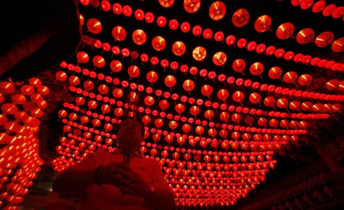 A Chinese man prays at a temple in Kuala Lumpur, Malaysia on January 26, 2009