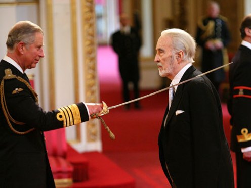 actor Christopher Lee was knighted by Prince Charles on behalf of the Queen for his services to drama and charity