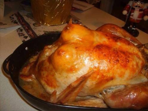 cut a lemon in half and stuff both halves under the skin