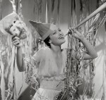 Dorothy Lamour.  Waving around a creepy&nbsp;mask.